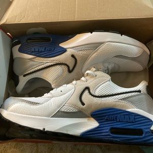 Brand new Nike Air Max size 10.5 blue and white with yellow Nike logo
